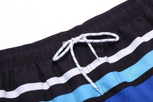 Men's board shorts with elastic waist and drawstring.