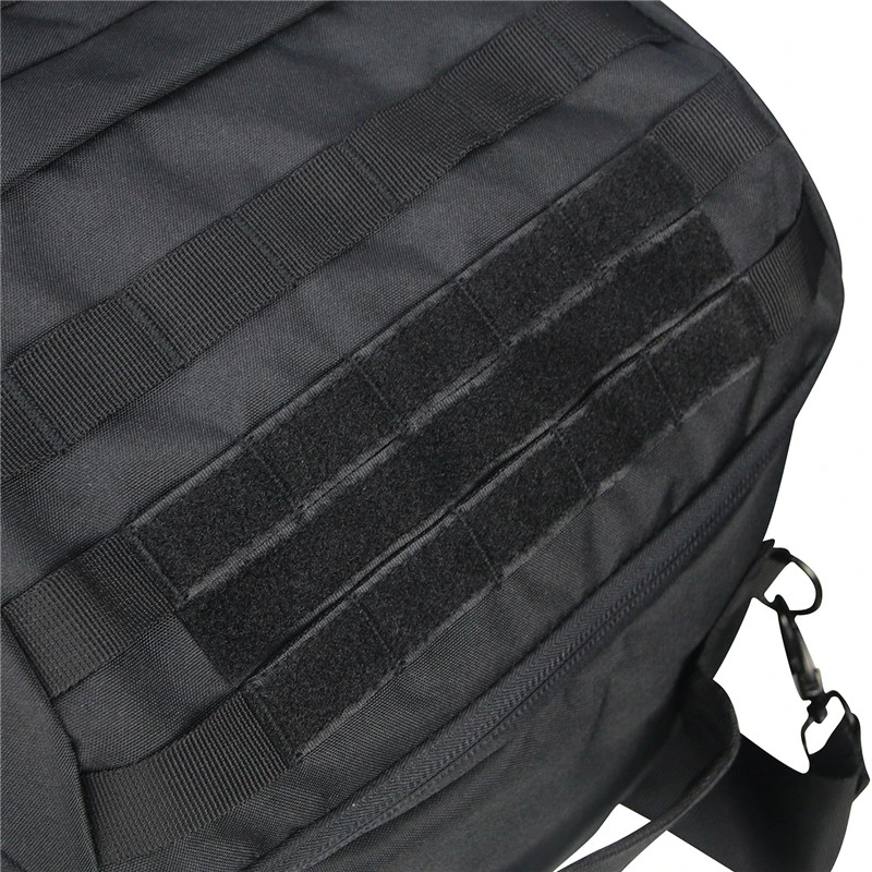 Velcro on a black rucksack for the purpose of sticking patchers or attaching additional smaller bags.