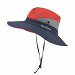 Red and navy blue sun shade hat with ponytail opening at the back. The hat is available in matching adult and kids size.  