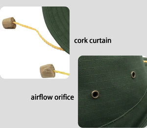 Green wide brim bucket hat with a cork curtain and air vent holes. 