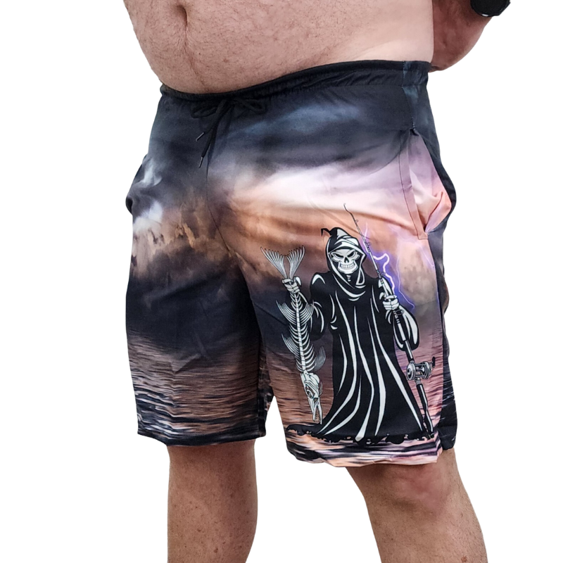 Boardshorts with dark stormy ocean and the grim reaper fishing design.