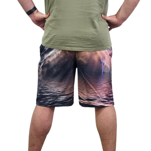 Male model with back turned wearing dark coloured quick dry fishing shorts.
