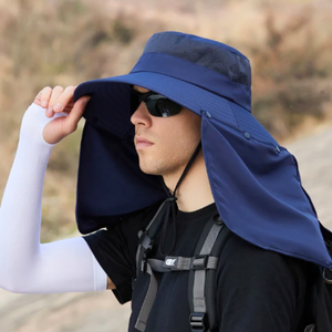 Man wearing a fishing hat that has mesh ventilation around the top of the head and a large long sun protective flap at the back.