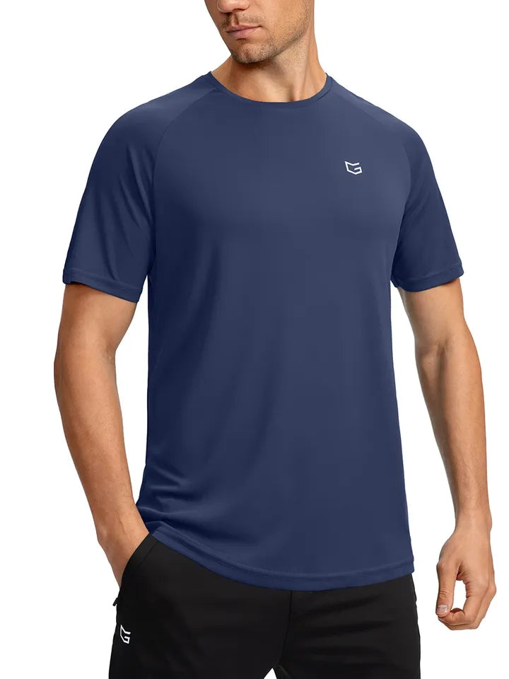 Navy blue Gradual brand t-shirt being worn by male model. 