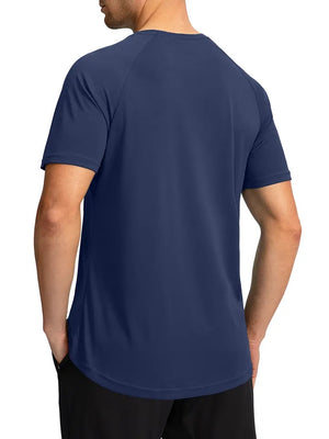 Man with back turned wearing a lightweight navy blue t-shirt.