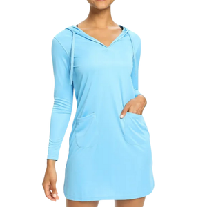 Female model wearing a blue Sun Protection Cover-Up Dress that has pockets and a drawstring hood.