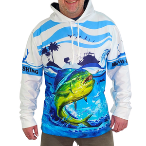 Male model wearing a blue, white and green fishing hoodie featuring a Mahi-Mahi fish, boat, waves and palm tree design.