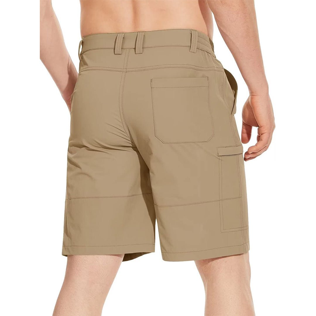 Back profile of the khaki Flex-fit Utility shorts being worn by a man with hand in his pocket.