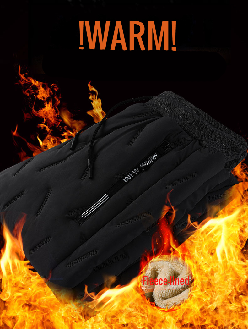 Black pants displayed on a bed of fire to express how warm the pants are to wear in winter.