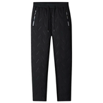 Black pants with zip pockets and elastic drawstring waistband. 