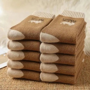 Warm socks made from Camel hair. Brown and cream with a picture of a camel.