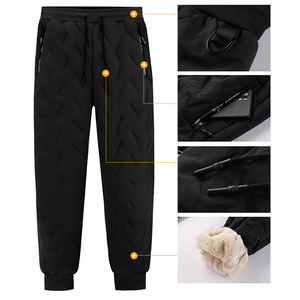 Black pair of fleece jogger pants with zip pockets and utility loop.