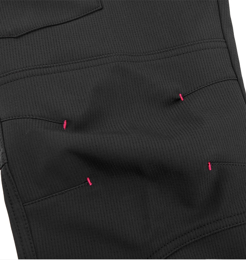 Ergonomic knee design on a pair of women's black hiking pants. 