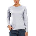 Women's Light Grey UPF 50+ Long Sleeve T-Shirt being worn by a female model with dark blue denim jeans on.