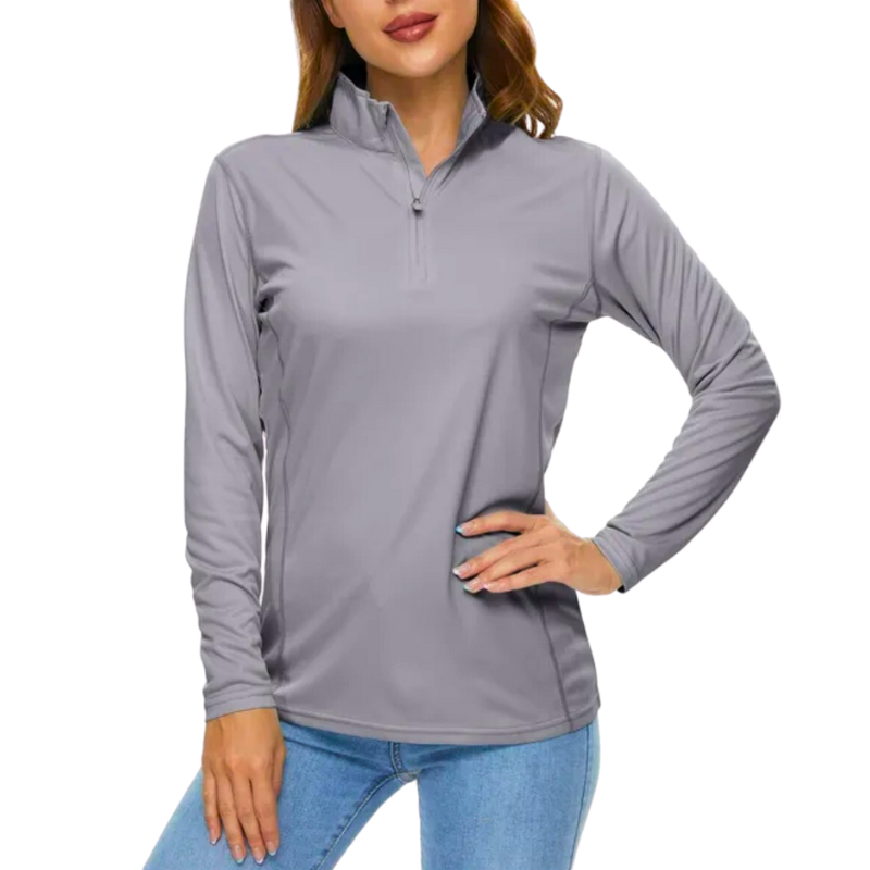 Model wearing the Women’s UPF 50+ Sun Protection Shirt in light grey. The shirt has a stylish 1/4 zip-up collar. 
