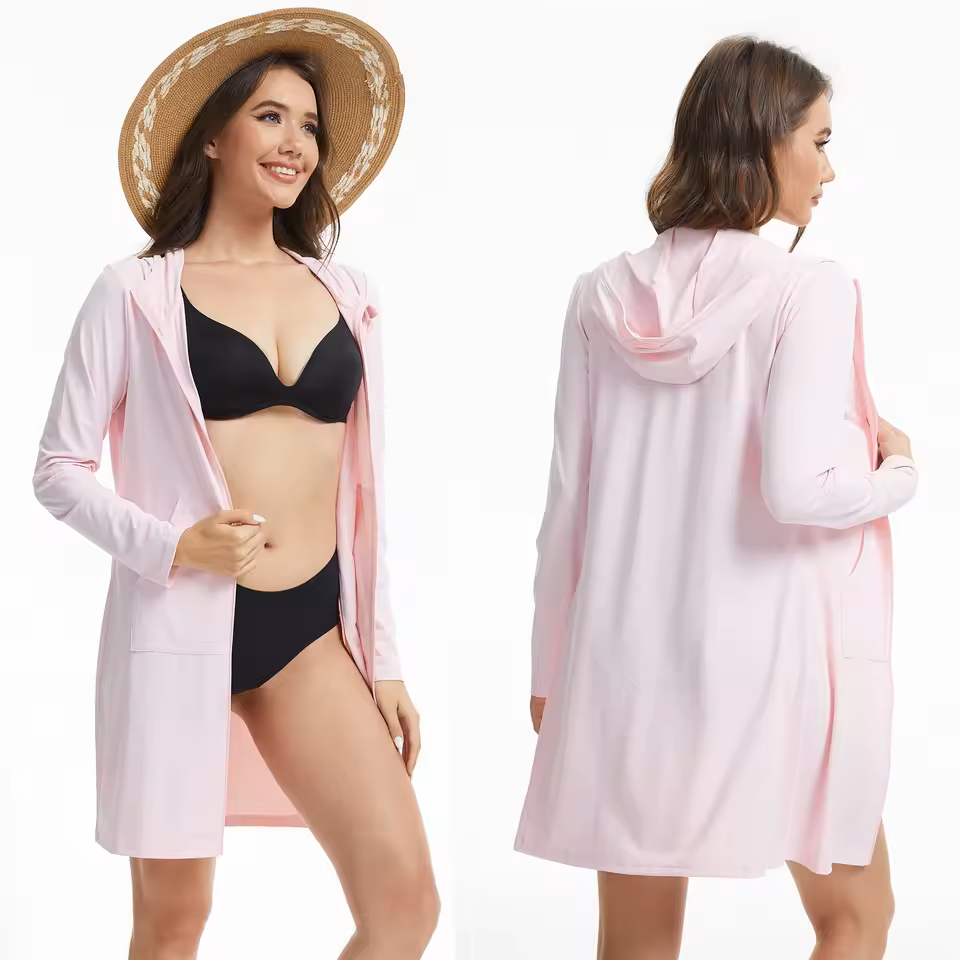 Woman wearing a pink cover-up and black bikini, shown from front and back on a white background.