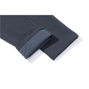 Grey pants with the hem turn up so you can see the warm fleece lining on the inside.