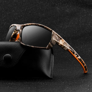 Men's sunglasses, Camoflaguge frame with black polarised lens.