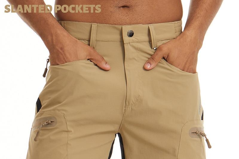 Man wearing khaki shorts with hands in pockets.