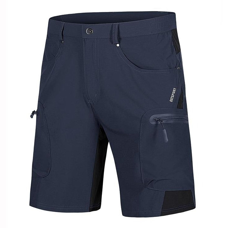 A pair of navy shorts that you can buy from Guts Fishing Apparel. The shorts have multiple pockets. Some pockets have zips and the shorts are made from quick drying nylon and polyester cloth.
