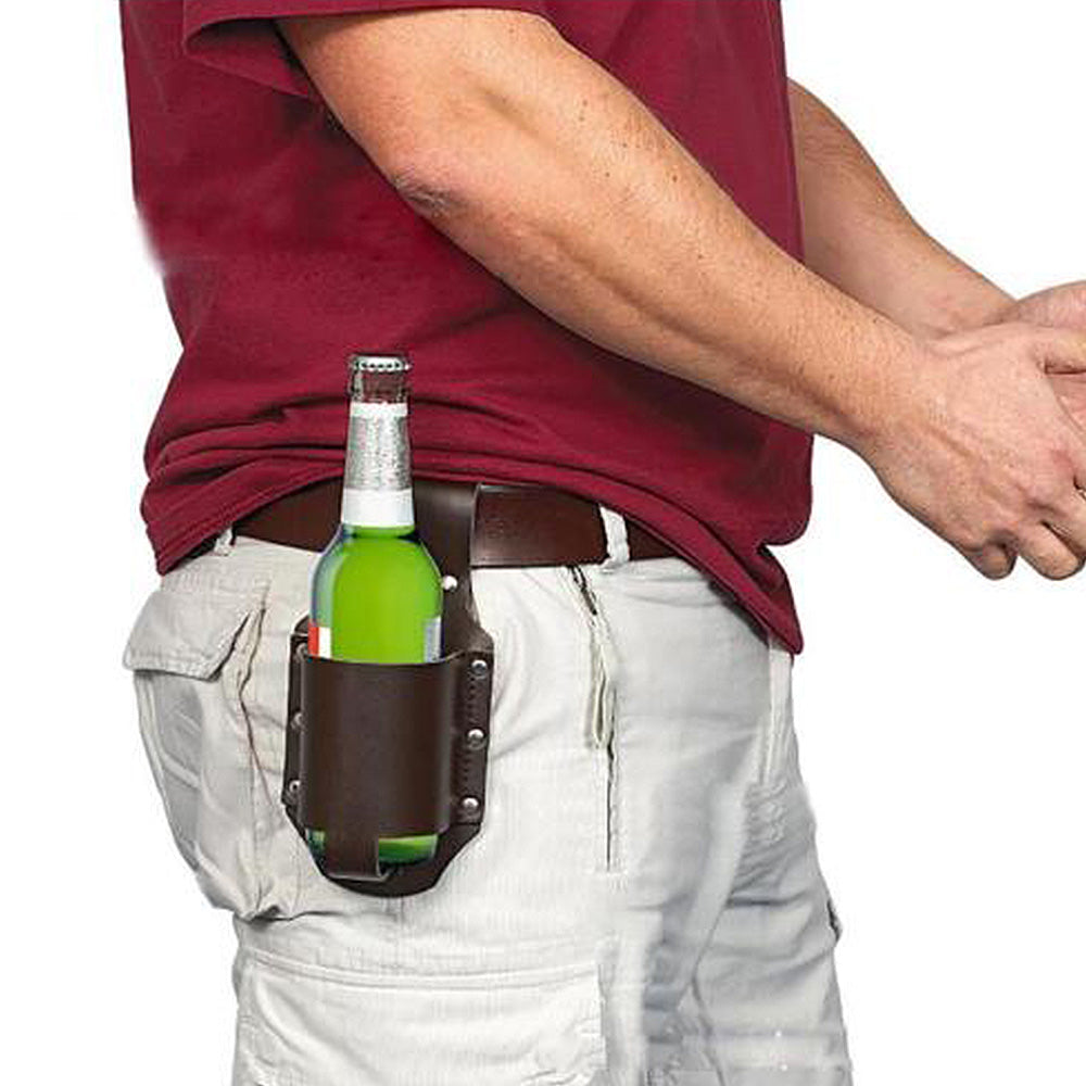 The brown leather beer holster being worn on a mans belt. 