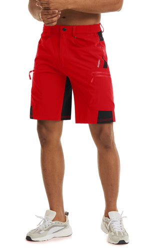 Male model wearing a pair of red shorts that you can buy from Guts Fishing Apparel. The shorts have multiple pockets. Some pockets have zips and the shorts are made from quick drying nylon and polyester cloth.