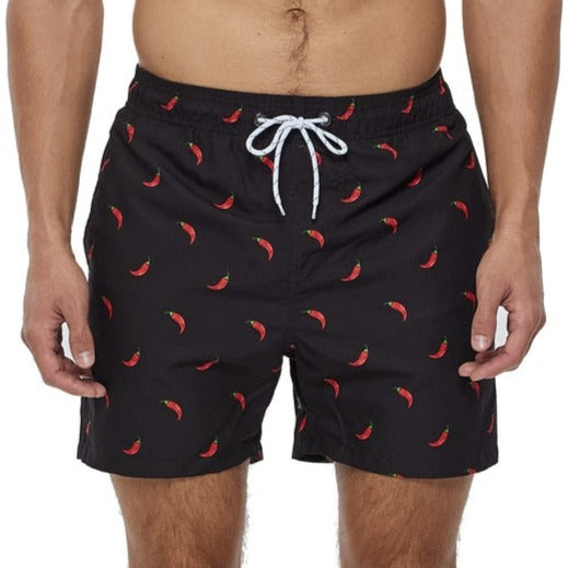 Men's black swim shorts with red chili print.