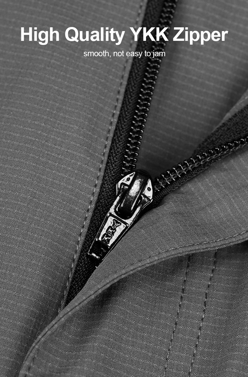 High quality YKK zipper on a pair of men's grey hiking shorts.