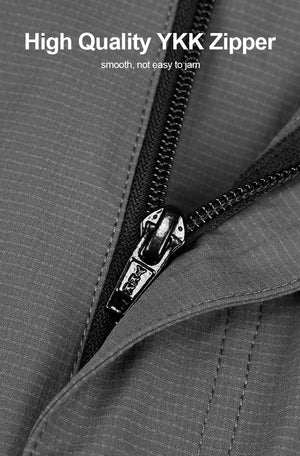 High quality YKK zipper on a pair of men's grey hiking shorts.