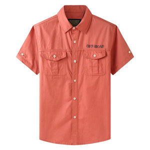 Orange button-up work shirt. Short sleeve. Off-road text above left chest.