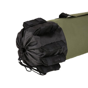 Duffel bag with drawstring closure and fishing rod holders on the outside. 