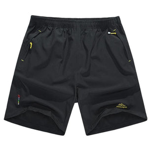 Men's sport shorts with zip pockets, black, stretch fabric.