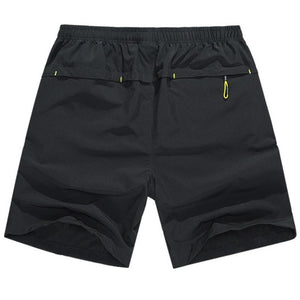 Guts Fishing Apparel - blue hiking shorts with zip up front and back pockets.