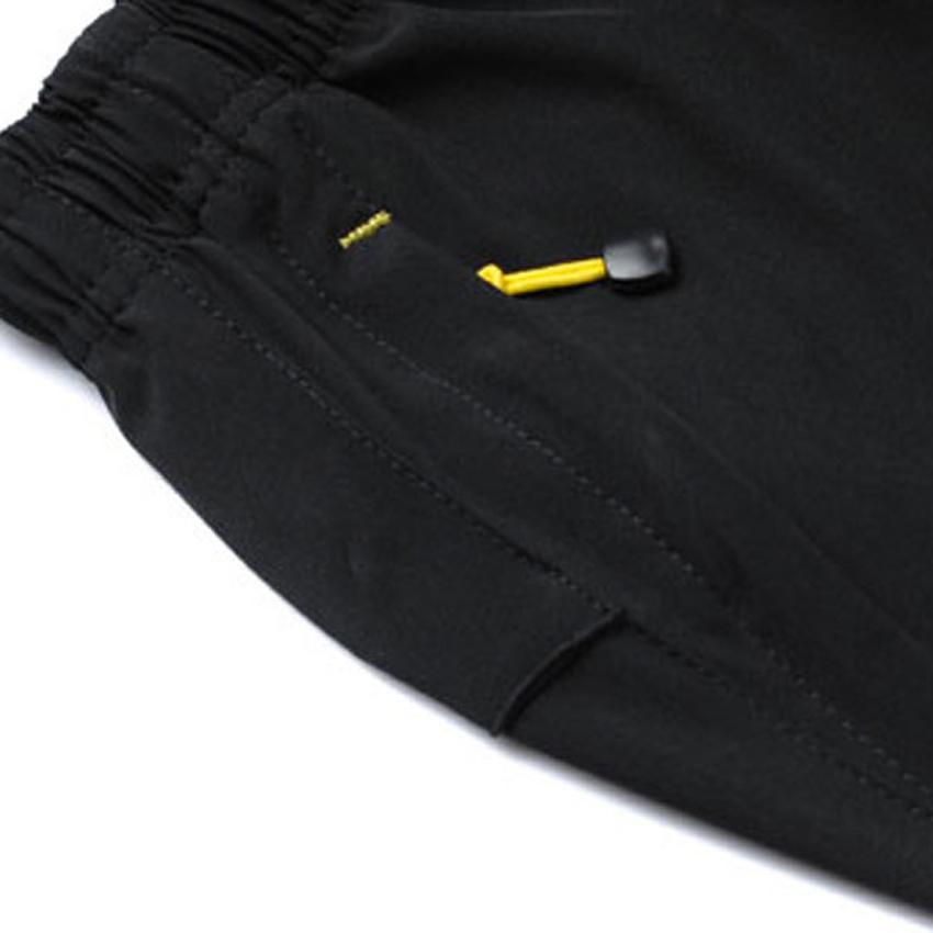 Guts Fishing Apparel - black hiking shorts with zip up front and back pockets.