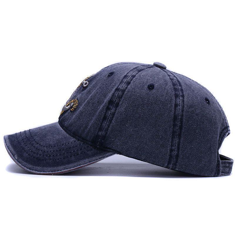 The Washed Anchor cap in navy blue side profile image. Hats for boating and fishing at Guts Fishing Apparel. 
