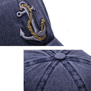 Navy blue men's baseball cap with anchor and rope embroidered design. 