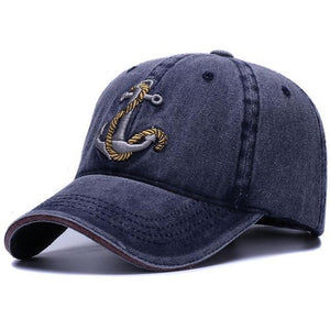 Navy baseball cap with an embroidered anchor and rope design. Get yours today at Guts Fishing Apparel.