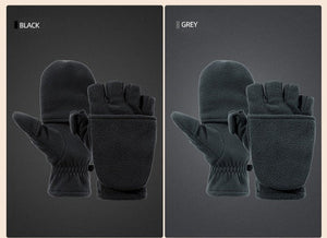 A pair of black and grey mittens that have a flip top thumb and a removable finger section.