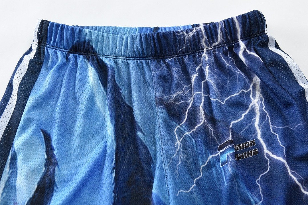 Blue long length fishing pants with an elastic waist.