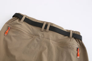 Two zip pockets on the back of khaki pants. Black quick release belt also included.