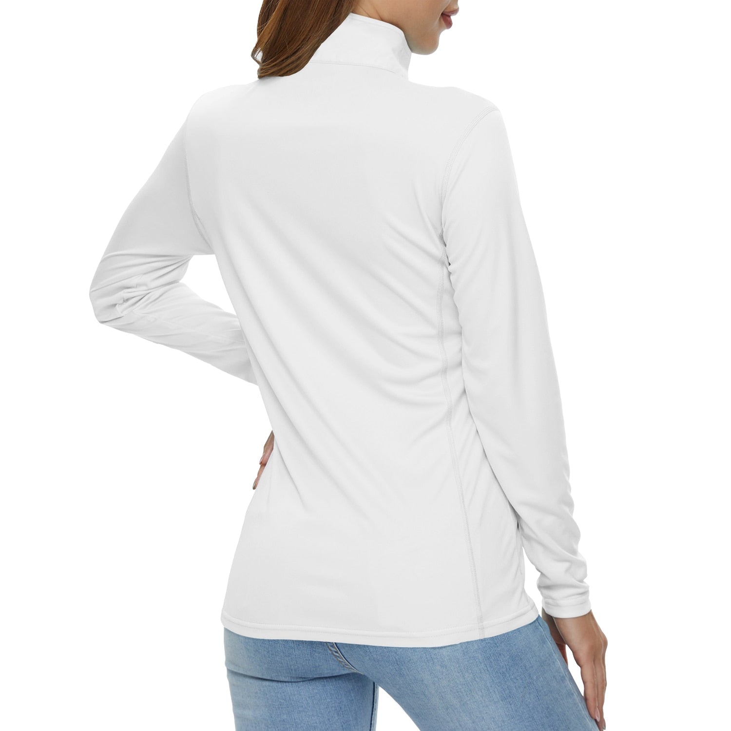 Female model with her back turned wearing a white long sleeve sun protection top. The lady has brown hair and is also wearing light blue jeans.