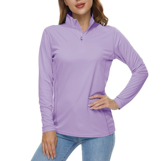 Light purple UPF 50+ sun protection top for women being sold in Australia by Guts Fishing Apparel. The lightweight and breathable shirt also has a zip up collar.