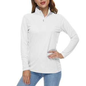 Lady wearing a white sun protection shirt. The shirt has long sleeves and a collar. The material is soft and feels nice on the body. 
