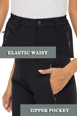 A black pair of warm waterproof pants with an elastic waistband and zip pockets. 