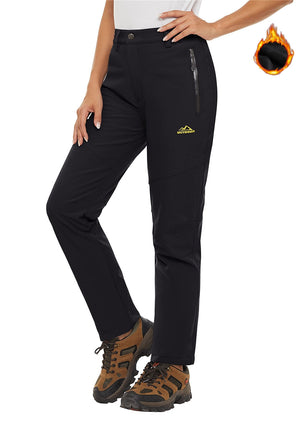 Women's waterproof pants with fleece lining. These black pants also have zip pockets. 