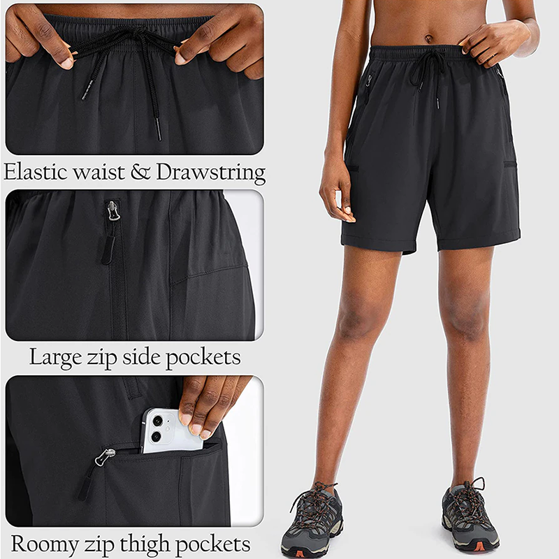 Women's black hiking shorts with zip pockets, drawstring and made from breathable fast drying fabric.