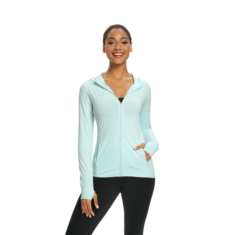 Women's light green UPF 50+ sun protection shirt with full zip up front, long sleeves and hood.