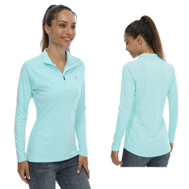 Front and back profile of a female model wearing a light green sun protection shirt with zip up collar and long sleeve. The cloth has a UPF 50+ sun protection rating. 