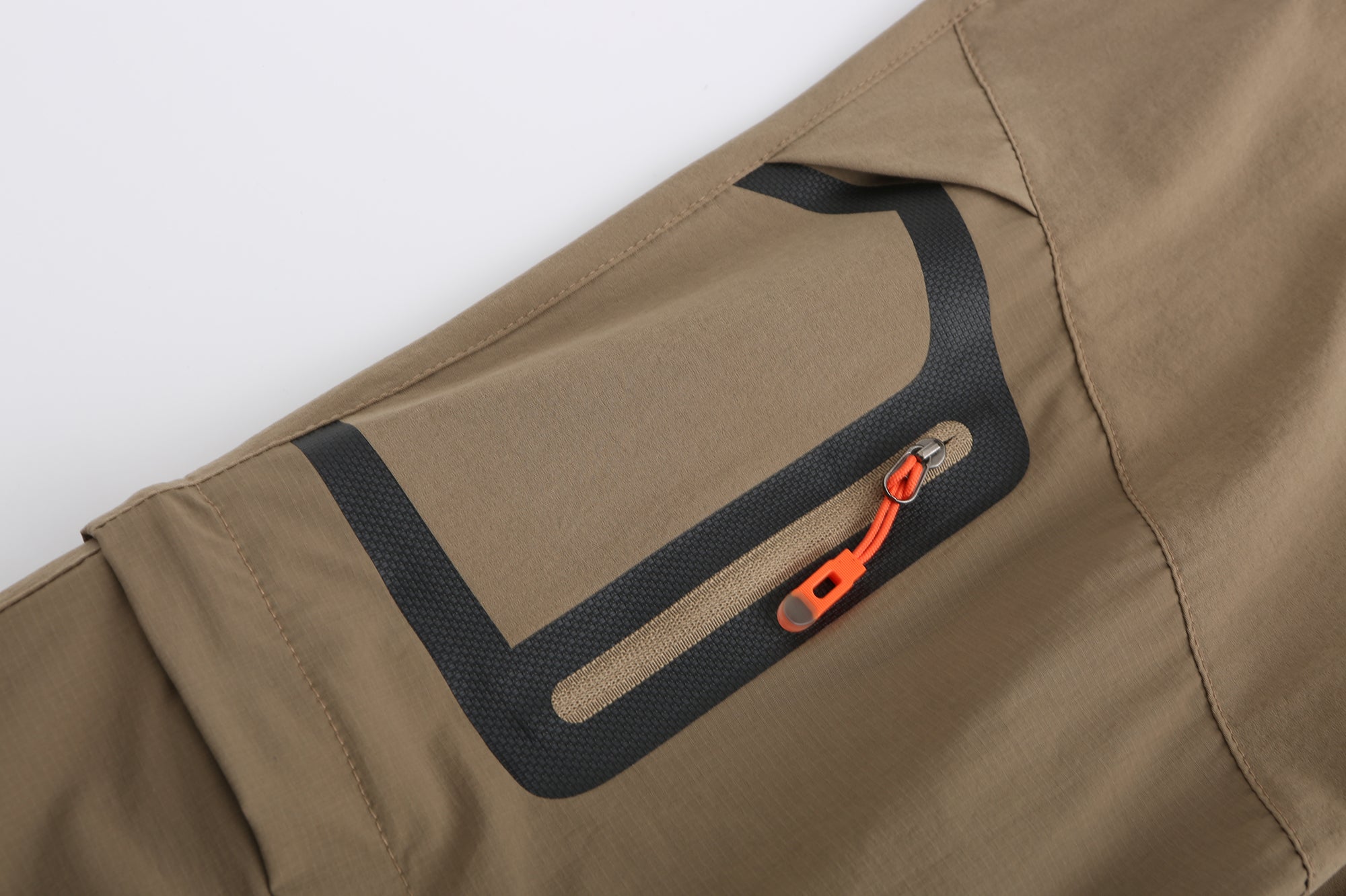 Waterproof zip pocket on women's pants.